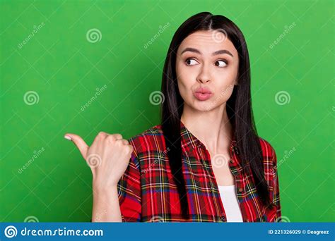 portrait of attractive curious girl demonstrating copy space ad avdert pout lips isolated over