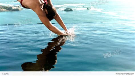 woman diving into the water in slow motion 영상 소스 4569417
