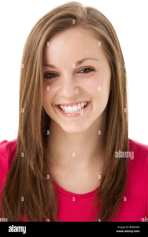 Studio Portrait Of Smiling Teenage Girl Stock Photo Alamy