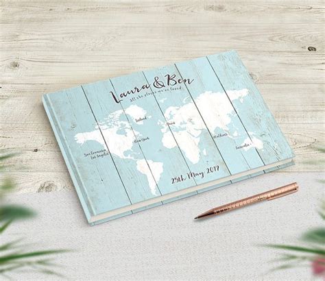 Simple folding seating chart on wood background. Travel Wedding Guest Book, Custom Map Cover, Travel Theme ...