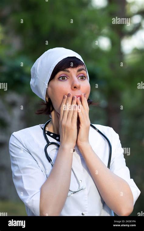 Female Doctor In A White Coat Screams Fear After Seeing Something