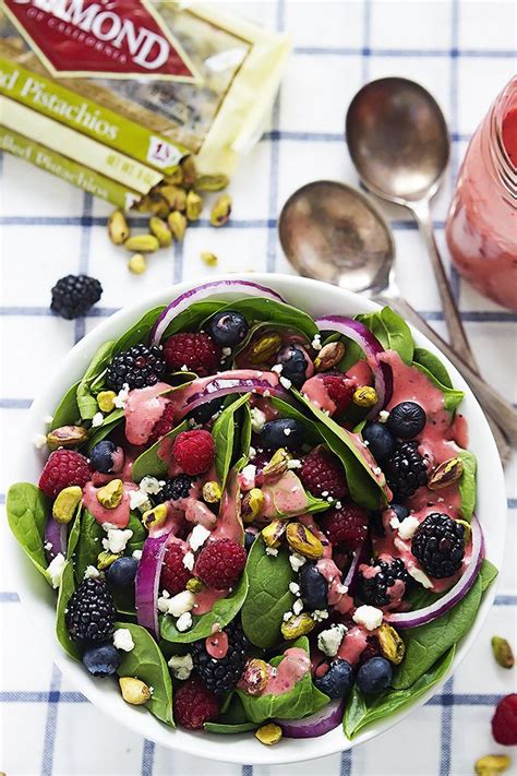 My mother made this salad and my family (those who don't have texture problems) loves it. Berry Lover's Spinach Salad with Berry Vinaigrette | Creme ...