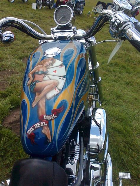 Pretty slim woman coming to the chopper at the mototrcycle workshop. Sportster Tank Art - Page 19 - The Sportster and Buell ...