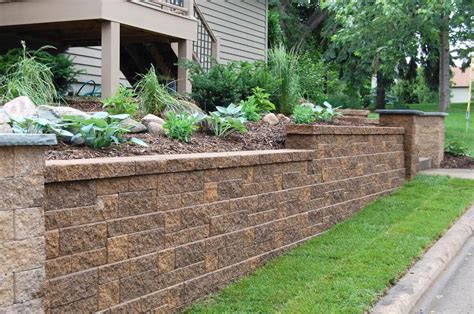 There will be great combination between cinders block wall and block seats. How to Build A Cinder Block Retaining Wall With Rebar ...