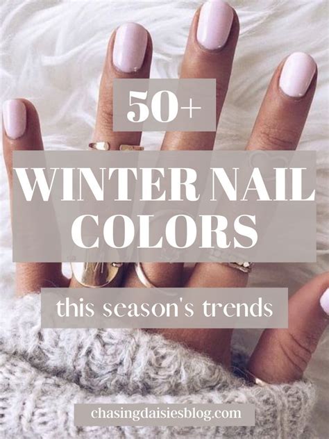 Someone Is Holding Their Nails Up With The Words 50 Winter Nail