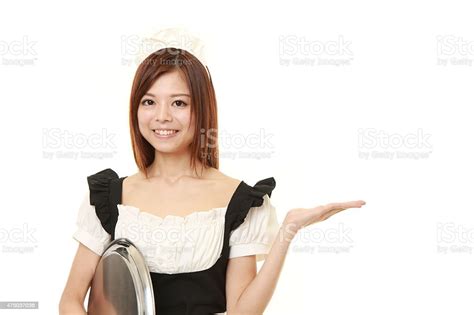 Japanese Woman Wearing French Maid Costume Presenting And Showing