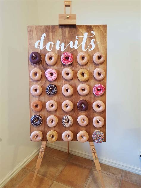 here s a donut board project you ll want at your own wedding donut wall diy donuts luau