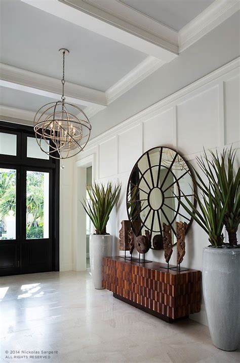 The mirror front and back barn door allows you to have the best of both worlds. Yawn Design | Awaken Process, Design, Environments | Foyer ...