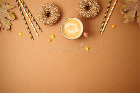 Coffee Cup Donuts And Autumn Leaves Fall Season Concept Background
