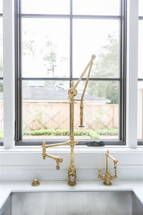 It's as simple, strong, and bright as you want. Vintage Polished Brass Swing Arm Faucet with Kitchen Sink ...