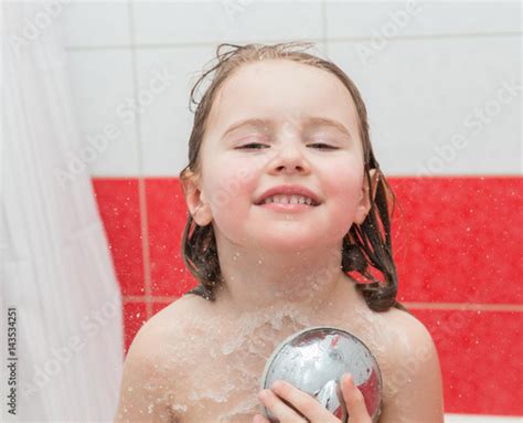 Small Child Enjoying A Shower Stock Photo And Royalty Free Images On