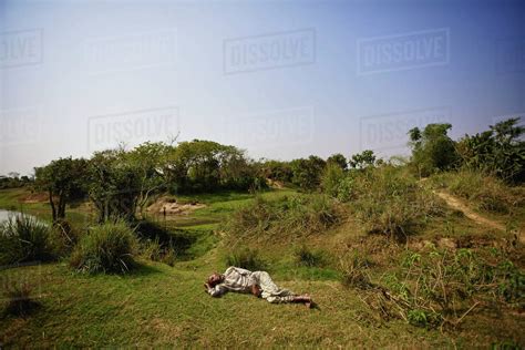 Man Sleeping In Field Sunamganj Bangladesh Stock Photo Dissolve