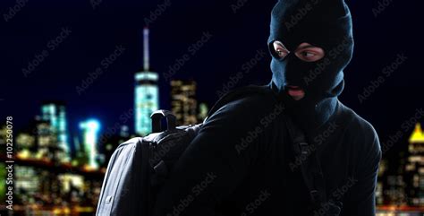 Thief Escaping In The Night Foto De Stock Adobe Stock