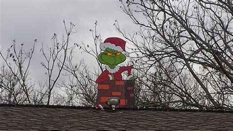 The odd thing is, the pallor of wildfire smoke that hung over the whole region this last weekend. Girl vs. House: DIY Holiday Roof Decor - The Grinch!