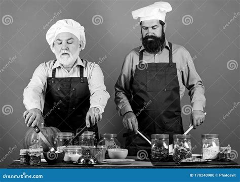 Father And Son Culinary Hobby Mature Bearded Men Professional Restaurant Cooks Chef Men Wear