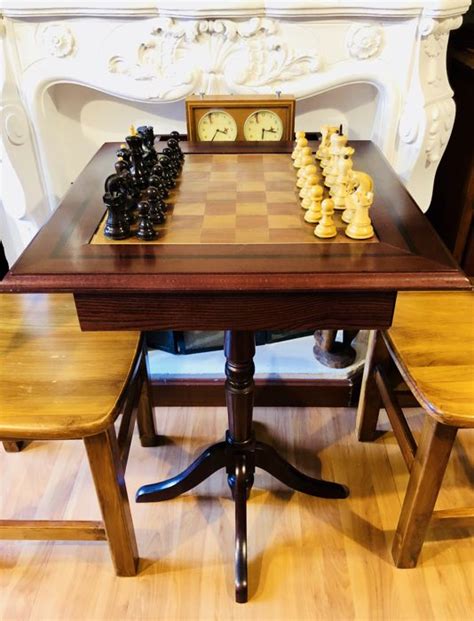 Maybe you would like to learn more about one of these? English club chess table with rosewood pieces and antique clock - Catawiki