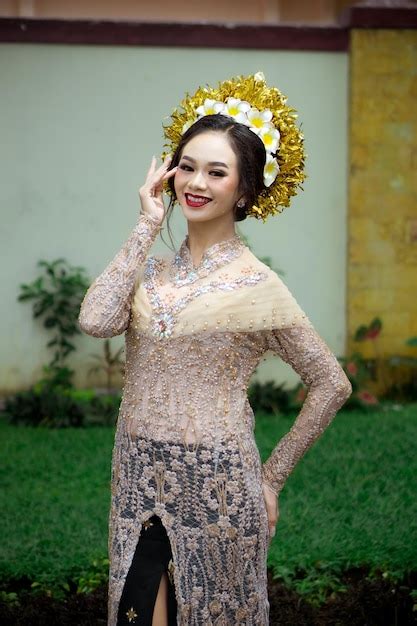 premium photo beautiful indonesian woman wearing kebaya kebaya is a type of upper garment that