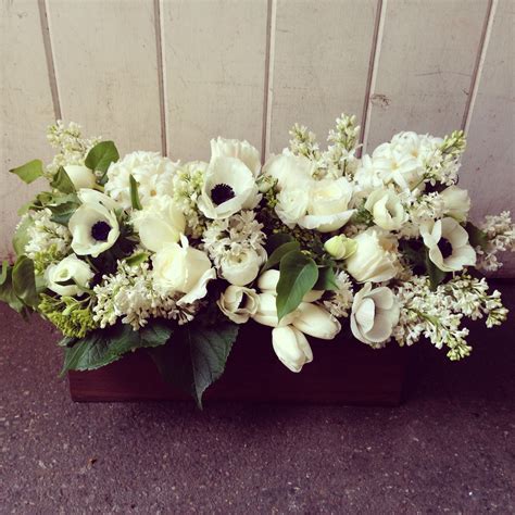 Long And Low Arrangement By Botany Including Garden Roses Hyacinth