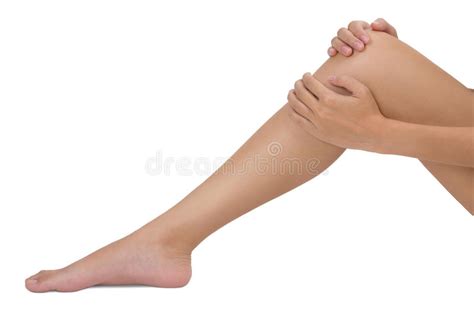 Woman Holding Her Beautiful Healthy Long Leg With Massaging Knee In