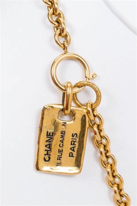 Check spelling or type a new query. Chanel Gold Logo Address Tag Necklace For Sale at 1stdibs