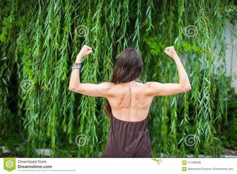 Beautiful Woman With Naked Back Over Green Weeping Willow Background