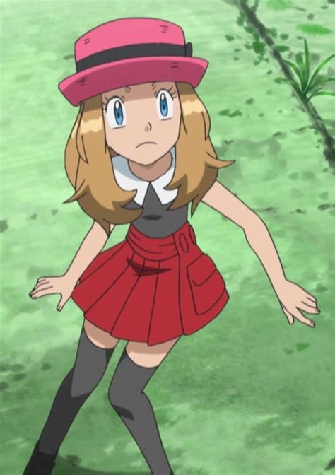 A Woman In A Red Dress And Hat With Her Hands On Her Hips Looking At