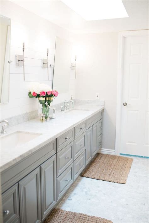 One of the 30 bathrooms remodel update ideas on a budget is to cover your vanity piece with fabric. Master bathroom remodel design before and after on a ...