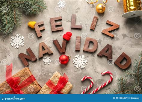 Words Feliz Navidad Made With Wooden Letters And Christmas Decorations