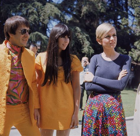 Great Outfits In Fashion History Sonny And Cher In Coordinating Saffron Looks Fashionista