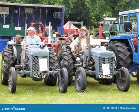 Two Men On Vintage Tractors At The Annual Todmorden Agricultural Show