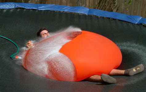 This Giant Water Balloon Bursting In Slow Motion Is Strangely