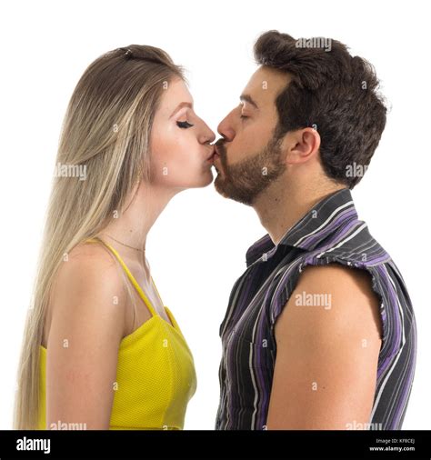 Girlfriend And Boyfriend Kissing Each Other A Couple In Love Is Kissing Gently Profile Face