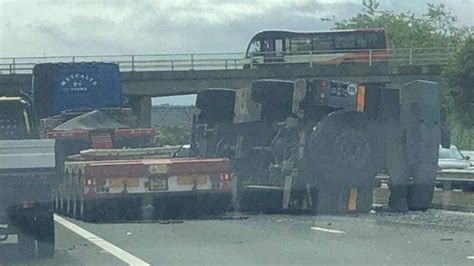 Major Delays After Lorry Sheds Its Load On M90 At Dunfermline Bbc News