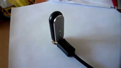 I tried to check if the charger gives any voltage output and it does. mi band charging - YouTube