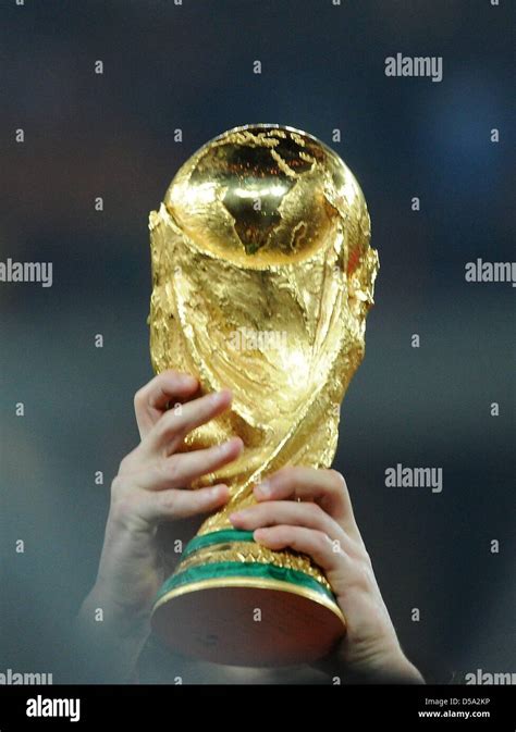 The World Cup Trophy Is Lifted After The 2010 Fifa World Cup Final Match Between The Netherlands