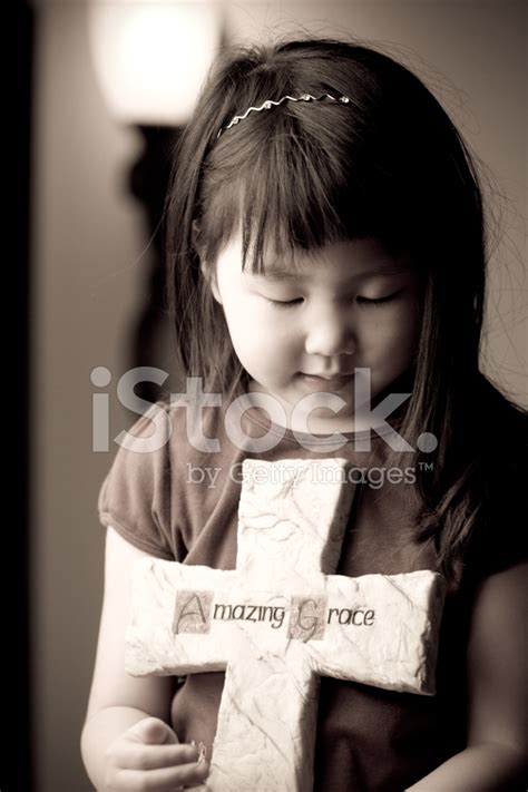 Cute Girl Praying Stock Photo Royalty Free Freeimages