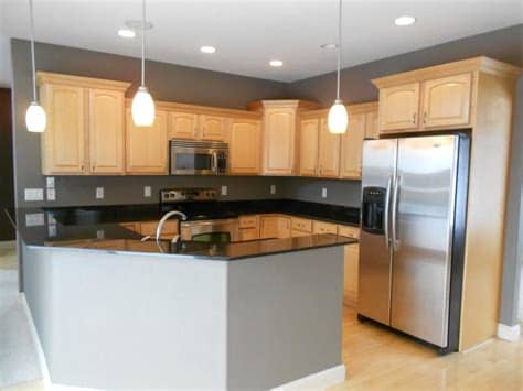 Cabinet finish ideas from wood grain cabinets, stained cabinets. Black Granite Countertop Maple Cabinets | Kitchen Ideas ...