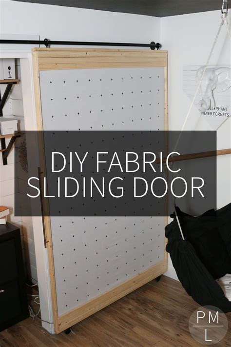 We drilled three holes in each flat metal bar, one at the top for attaching the roller wheel, and two at the bottom for attaching the door. DIY Fabric Sliding Door - Petite Modern Life | Diy ...