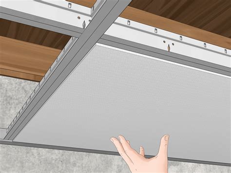 However, the commercial appearance and grainy texture of basic ceiling tiles make them an unlikely. How to Install a Drop Ceiling: 14 Steps (with Pictures ...
