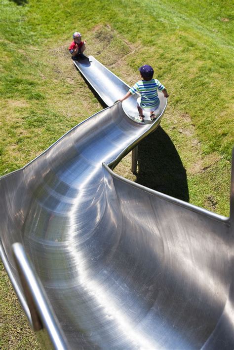 A Bespoke Stainless Steel Curved Slide At Drapers Field Constructed