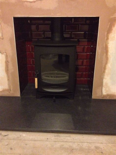 Check spelling or type a new query. Charnwood C4 stove. Red tiles from Fired Earth's ...