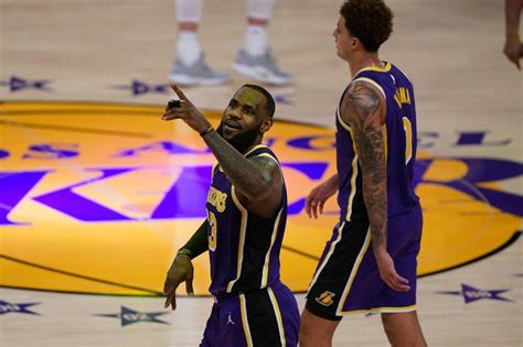 Nba Anthony Davis Lebron James Carry Lakers Past Grizzlies Abs Cbn News