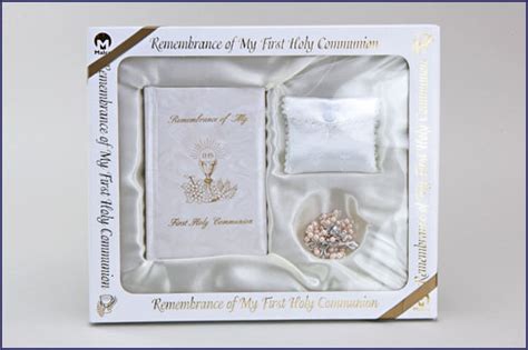 The first communion keepsake box or birthstone rosary bracelet would surely make her smile on the day she first takes the eucharist. First Communion Gift Girl 31066