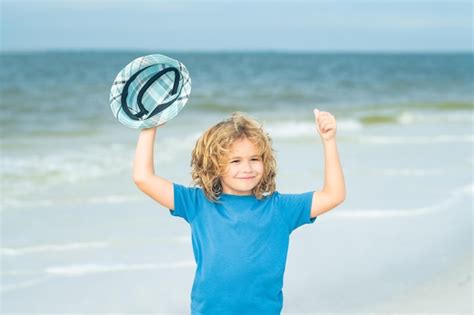 Premium Photo Summer Child Face Cute Kid Enjoying Summer Sea And