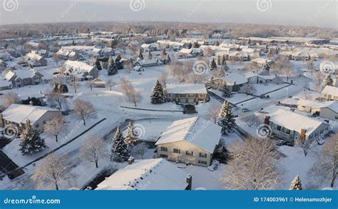 Aerial View Of Residential Houses Covered Snow At Winter Season