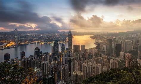 Come with us through the brightly lit, and empty of. Day and Night Hong Kong city | City, City skyline, Hong kong