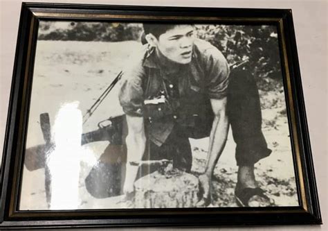 Framed Photograph Of A Viet Cong Laying A Mine Enemy Militaria