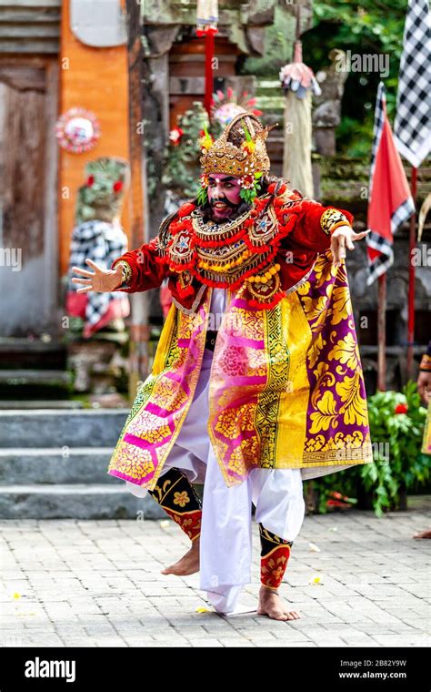A Male Performer Dancing During A Traditional Balinese Barong And Kris