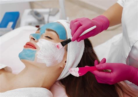 Spa Woman Applying Facial Cleansing Mask Stock Image Image Of Facial Cosmetologist 153896237