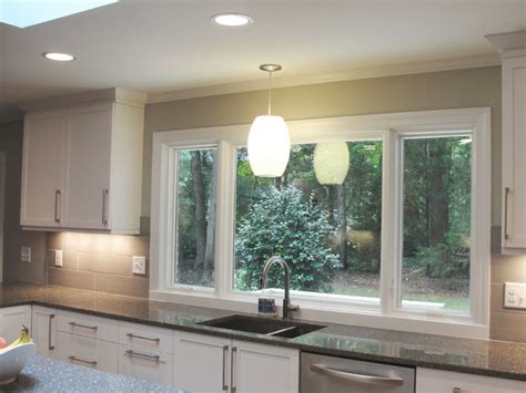Casement windows & awning windows are hinged windows that swing outward, making it easy to let fresh air into your home. Large Window Over Sink - Contemporary - Kitchen - Raleigh ...